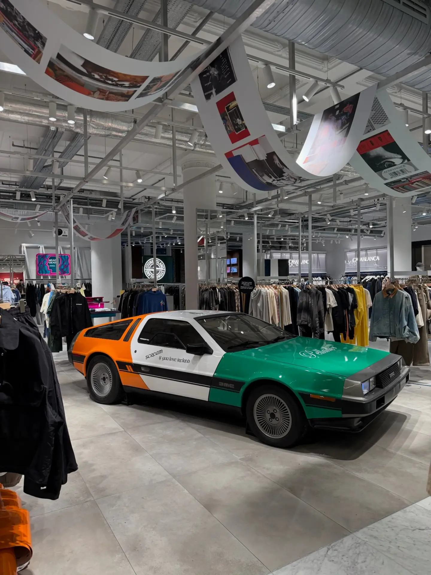DeLorean wrapped in a multicolour vinyl design by Tauro Design