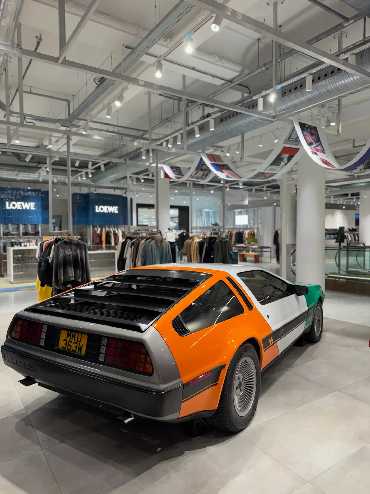 DeLorean wrapped in a multicolour vinyl design by Tauro Design, view 4